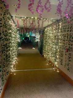 the hallway is decorated with flowers and lights