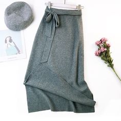 Elegant High Waist Split Knit Skirt - Uniqistic.com Winter Knit Solid Color Skirt, Winter Knit Relaxed Skirt, Knitted Skirt For Fall, Winter Knit Skirt With Relaxed Fit, Winter Knee-length Knit Skirt, Winter Solid Color Pencil Skirt, Winter Knit Midi Skirt, Knit Midi Skirt For Winter, Fall Knitted Skirt