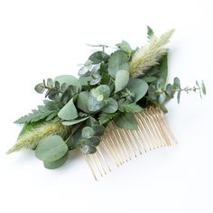 a hair comb with green leaves and greenery