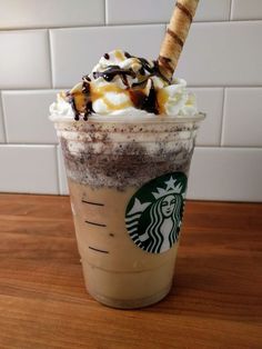 a starbucks drink with whipped cream and chocolate