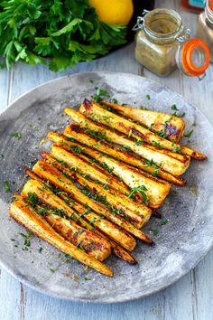 grilled french fries on a plate with parsley