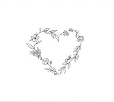 a heart shaped frame with flowers and leaves in the shape of a flower on a white background