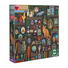 the puzzle box is filled with many different items, including an orange cat and other objects