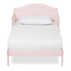 a pink bed with white sheets and pillows