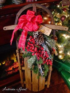 a wooden sled filled with christmas decorations