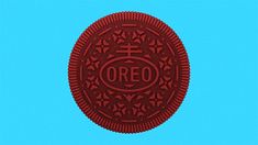 an oreo cookie with the word oreo written in red on it's side