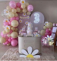 a birthday party with balloons and decorations