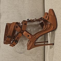 Authentic Giuseppi Zanotti Wrap Around Strappy Sandals Heels. Color: Brown. Size: 36.5. Preowned Never Used Only Tried On. From 2014. No Box Or Dustbag. All Items From My Personal Collection. From A Smoke Free Pet Free Home. Same Day/Next Day Shipping. No Trades. Thanks For Looking. Tags: Zanotti, Zanotti Heels, Zanotti Shoes, Giuseppi Zanotti, Brown Heels, Strappy Heels, Sandals, Strappy Sandals, Brown Sandals, Brown High Heels, Brown Shoes, Brown Leather Shoes, Brown Leather Heels, Zanotti Sal Designer Leather Heels With Wrapped Heel, Wrap Around Heels, Brown High Heels, Zanotti Heels, Heels Strappy, Unique Heels, Giuseppe Zanotti Heels, Heels Brown, Shoes Heels Classy