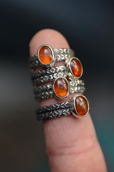 Handmade orange kynite ring with a double textured ring band. There are different sizes available. At the end I use renaissance wax on my silver piece. So the silver won't tarnish so nearly. Everything in my shop is handmade by myself in my little studio. I put a lot of time and love into my work and I love to be an artist. If you have some questions please send me a message!! Handmade silver ring with an orange kyanite stone. The rings were made of sterling silver. There are different ring sizes to choose from. At the end I use the Renaissance Wax to slow down the oxidation of the silver. I make all my jewelry in my small workshop. If you have any further questions, please feel free to write to me! Textured Ring Band, Artisan Necklace, Witchy Jewelry, Labradorite Jewelry, Textured Ring, Double Ring, Silver Jewelry Handmade, Silver Rings Handmade, Silver Pieces