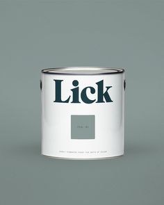 a white paint can with the word lick painted on it's side and bottom