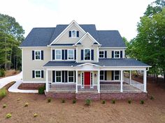 this is an artist's rendering of a two - story house in the woods