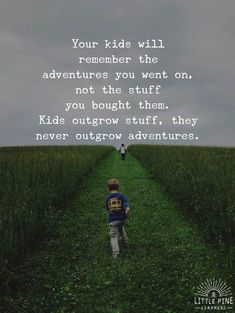 two children walking down a path in the middle of a field with an inspirational quote on it