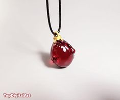 Egg of the King Necklace. Crimson Necklace. Egg of the King Pendant. Griffith Cosplay. Berserk Necklace Gift. Band of Hawk Wear this Egg of the King necklace to freak your fan friends out! This Crimson Egg of the King Necklace would be great for any cosplay or even just for adding a geeky touch to your everyday fashion. It also make the perfect addition to your collection. Comes fully packaged, a ready-to-go gift for yourself or a friend! 🎁 ✨ SPECS ✨  - Made of Resin - Dimension: Pendant height 1.5 inches, Pendant width 1.0 inches - Length of the necklace is custom fit to your measurements. 💖 PLEASE NOTE: All mail is currently experiencing delays. Please order well in advance if you need items by a certain date. Arrival times are not guaranteed. Due to COVID-related safety precautions, t Berserk Necklace, Griffith Cosplay, King Necklace, Safety Precautions, Necklace Gift, The King, Gift Necklace, Festival Season, Custom Fit