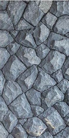 an image of a stone wall that looks like it is made out of rocks