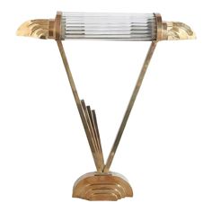 an art deco table lamp on a white background