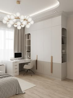 a bedroom with white walls and wooden floors is shown in this image, there is a desk that has a computer on it