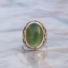 NOTE : WE USED NATURAL GEMSTONES , SO STONE  MAY BE LITTLE DIFFERENT .This  is a listing  of Boho sterling silver ring # metal = sterling silver  925 # Gemstone  - Green Jade# Ring Size - Available in all Size # Stone Color - Green# Stone Shape - OvalHandmade Crafting bohemian Ring - This style has bohemian style . it will look beautiful when you wear it ..Thanks for visiting our shop ...  favorite our shop for daily updates ... Handmade Green Toe Ring, Bohemian Green Wedding Rings, Bohemian Oval Cabochon Ring, Bohemian Oval Crystal Ring Nickel Free, Bohemian Style Oval Crystal Ring Nickel Free, Bohemian Cabochon Rings As A Gift, Bohemian Oval Crystal Ring Nickel-free, Bohemian Cabochon Ring For Gift, Bohemian Cabochon Rings As Gift