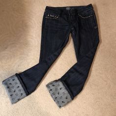 One-Of-A-Kind!! Limited Edition Pair Of Miss Me Jeans Sz 28. Roll The Pants Up For A Unique Look!!! Fit Runs Small And More Like Sz 27 Or Possibly Even Sz 26 With The Waist Measuring 15”. Brand New Without Tags So Denim In Pristine Condition. Dark Wash Denim Without Distressing, With Black Lace At Back Waistline And White Fraying At Pocket Edging. Both Rear Pockets Are The Same With Added Embellishments And Fraying (See Pics). Front Belt Loops Are Also Black Lace As Well As Front Baby Pocket On Harley Davidson Skull, Size 28 Jeans, Miss Me Jeans, Dark Wash Denim, Copper Color, Miss Me, Inside Pocket, Black Lace, Embellishments