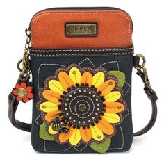 Sunflower Navy Cellphone Crossbody  by Chala Brand new with tag. Size 5 w in x .75 d in x 7 H inches Strap adjusts to Clutch or Wristlet, Purse & Crossbody Convenient, Compact, Fun Small front pocket adorned with our Sunflower design Adjustable strap - turn bag into a purse, a crossbody bag, or even a pouch! Top zipper closure Soft lining inside 3 credit card slots inside 2 Adjustable straps that are detachable Extra padding throughout bag to protect your cell phone Materials: Faux Leather Color Chala Handbag, Vans Backpack, Crossbody Phone Purse, Organic Kids Clothes, Cell Phone Bag, Cell Phone Purse, Phone Purse, Phone Bag, Cross Body Handbags