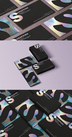 the business card is designed to look like it has been painted with metallic foil and black paper