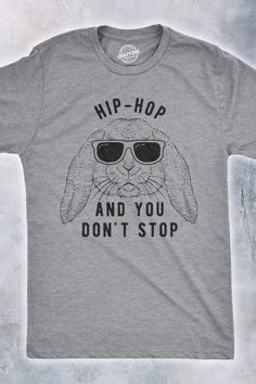 This Easter, it's all about the beat. Get into the holiday groove with our 'Hip-Hop and You Don't Stop' men's t-shirt. Perfect for rap and hip-hop enthusiasts who want to mix a little rhythm with their holiday spirit. The shirt boasts a slim fit and comfortable fabric, ideal for those who like to move. Featuring a cool bunny meme, it's sure to be a hit at Easter parties or any casual hangout. Get yours and be ready to hop to the beat this Easter season! Easter Gift For Adults, Funny Easter Bunny, Nerdy Shirts, Funny Easter, Easter T Shirts, Funny Dad Shirts, Easter Humor