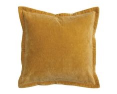 a yellow pillow with ruffled edges on a white background