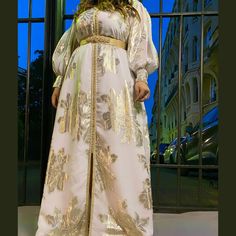 Elegant Gold Kaftan For Diwali, Wedding Kaftan With Zari Work, Elegant Dabka Gown For Eid, Elegant Festive Gown With Dabka, Elegant Festive Gown With Dabka Detailing, Elegant Dabka Gown For Festive Occasions, Gold Dabka Wedding Dress, Elegant Gown With Zari Work For Eid, Elegant Party Abaya With Dabka Detailing