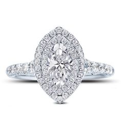 an oval cut diamond ring with pave set shoulders