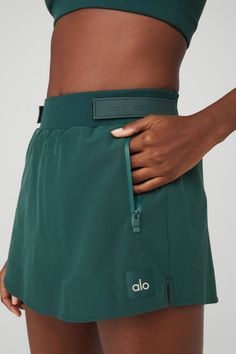 Cold-weather-approved mini skirts are totally a thing. The High–Waist Elevation Mini Skirt has a fleece-lined inside short for all-weather cute, and hits at mid thigh with an elastic logo waistband. Wear it with the Cropped Elevation Coverup for a complete look. Green Activewear, Athletic Sets, Green Athleisure Workout Skort, Green Sporty Short Skirt, Athleisure Mini Skirt With 4-way Stretch, Green High-waisted Shorts For Yoga, Sporty Green Mini Skirt With Built-in Shorts, Fleece Skirt, Womens Onesie