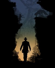 the silhouette of a man in a hat and coat walking into a cave with trees