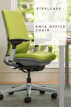 an office chair sitting in front of a window with the words steelcase mia office chair