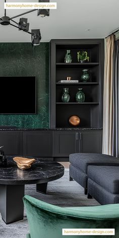 a living room filled with furniture and a flat screen tv