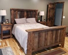 a bedroom with a bed and two nightstands