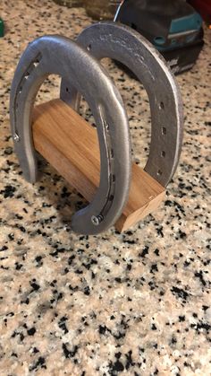 a pair of horseshoes sitting on top of a counter