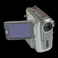 a digital camera with a purple screen attached to it