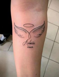 a woman's leg with an angel tattoo on it and the words, florida