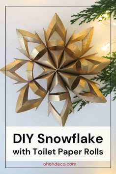 an origami snowflake with toilet paper rolls on it and the text overlay reads diy snowflake with toilet paper rolls