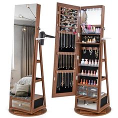 two wooden jewelry racks with mirrors and drawers