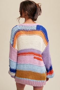 The Hand-Knit Multi-Striped Cardigan is a cozy and eye-catching layer that effortlessly combines warmth with style. Crafted with meticulous hand-knitting, this cardigan features a vibrant array of stripes, adding a playful and dynamic touch to your outfit. Whether you're layering it over a simple tee or dressing it up for a more polished look, this cardigan is a versatile and fashion-forward choice for any occasion.- Model is 5' 7" 31-24-35 and wearing a size Small Style: Cozy Print / Pattern: S Handknit Design, Core Outfits, Colorful Clothes, Nostalgia Core, Simple Tees, Long Puff Sleeves, Striped Cardigan, Sheer Fabric, Your Outfit