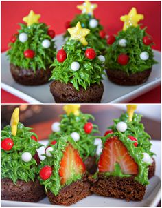 some cupcakes decorated like christmas trees on a plate with strawberries in the middle