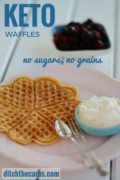 a plate with waffles, yogurt and jelly on it that says keto waffles no sugar, no grains