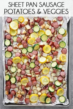 sheet pan sausage potatoes and veggies on a baking sheet with text overlay