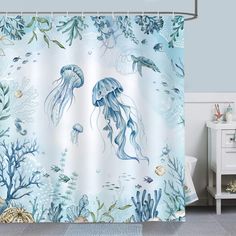 PRICES MAY VARY. Premium Material: Crafted from eco-friendly 100% polyester fabric, our Jellyfish Shower Curtain is wrinkle-resistant and durable. Its waterproof design ensures resilience in moisture-rich bathroom settings. Unique Design: Delve into a mesmerizing underwater world with our ocean-themed shower curtain. Featuring lively jellyfish, nautical creatures, turtles, seahorses and coral, it brings the serene beauty of the ocean into your bathroom. Size: 72 x 72 Inch (183 x 183 cm), due to manual measurement, please kindly allow 1-2 cm deviation. The standard size shower curtain fit for most bathtubs and shower stalls. Easy to Install: Equipped with rustproof metal grommets at the top and 12 plastic hooks included, this underwater sealife shower curtain can be effortlessly hung on the Coastal Shower Curtain, Nautical Shower Curtain, Coral Bathroom, Ocean Shower Curtain, Ocean Plants, Plastic Curtains, Cool Shower Curtains, Modern Shower Curtains