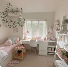 a bedroom with white walls and pink furniture