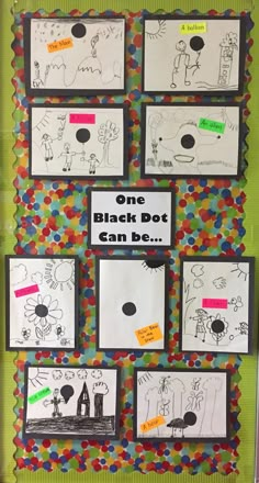 a bulletin board that has been decorated with different pictures and words on it, including one black dot can be