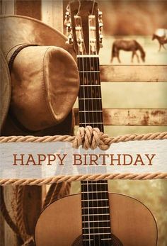 a cowboy hat and guitar with the words happy birthday written on it in front of an image of horses