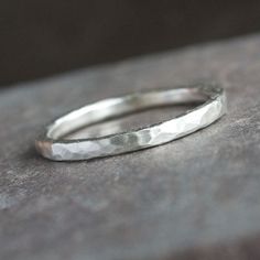 Kala - Hammered Sterling Silver Ring Band in Brushed Matte finish Silver Jewelry Ideas, Ruby Engagement Ring Vintage, Sequel Trilogy, Vintage Engagement Rings Art Deco, Architectural Jewelry, Silver Ring Band, Hammered Silver Ring, Sterling Silver Promise Rings, Diamond Cluster Engagement Ring