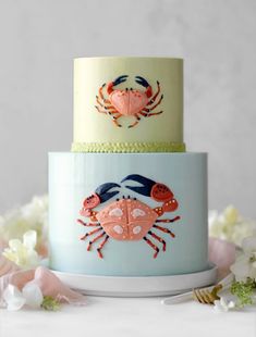 two tiered cake decorated with crab and lobster decorations