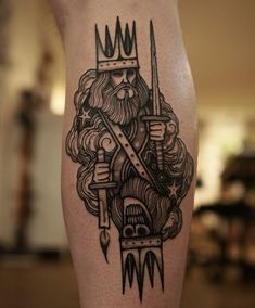 a man's leg with a tattoo on it