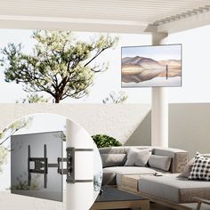 an outdoor living area with couches, table and television mounted to the wall above it